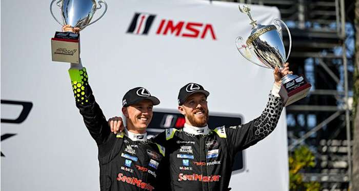 GTD PRO class winners Jack Hawksworth and Ben Barnicoat celebrate Saturday's win in their No. 14 Lexus RC F GT3. Photo courtesy IMSA.